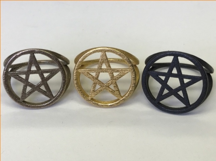 Pentacle ring (customize) 3d printed A choice of steel. Left to right: stainless (bronze-infused) steel; matte gold steel; matte black steel.
