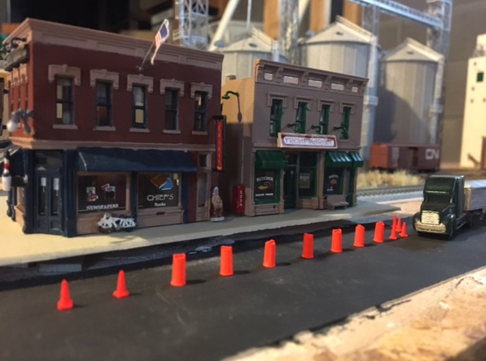 'N Scale' - Road Construction Cones & Barrels 3d printed Working on the curb to raise the existing road.