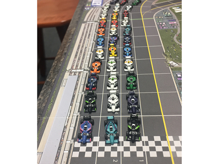 Miniature F1 (42pcs) - Hole variant 3d printed Hand-painted cars. Board copyright GMT games. Pic courtesy Drury67 (on BGG).