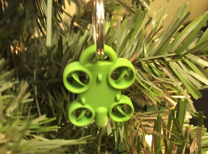 Minature Drone Ornament 3d printed Green Keychain shown being used as a Christmas tree ornament.  Key ring not included with purchase.
