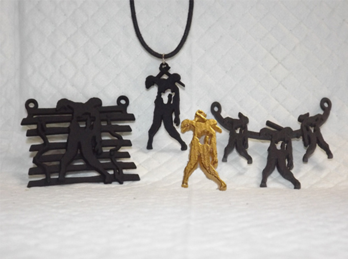Spike The Zombie Pendant 3d printed Group of Zombie Pendants, unpainted plastic, polished gold steel & matte black steel.