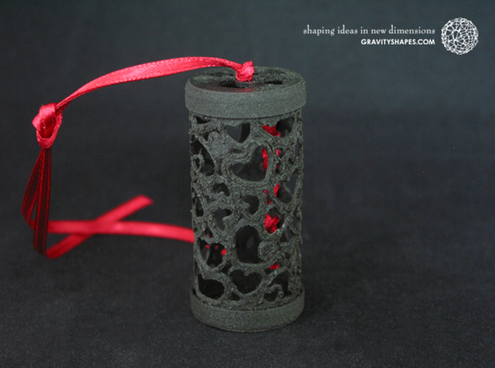 Filigree Gift roll small with Hearts (6 cm) 3d printed The photo shows an own print (FDM print) from a very similar roll made of black wood incl. decorative lacing.