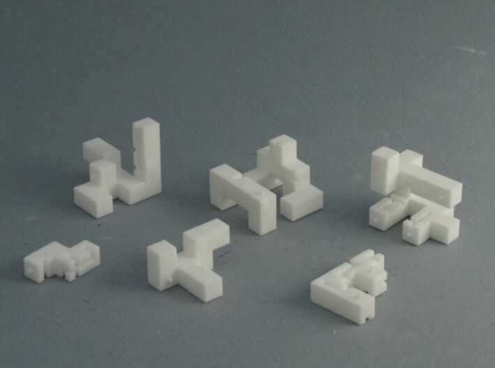 Titan – Interlocking Cube Puzzle w/ Pegs and Slots 3d printed  The Challenge is to assemble these into a cube