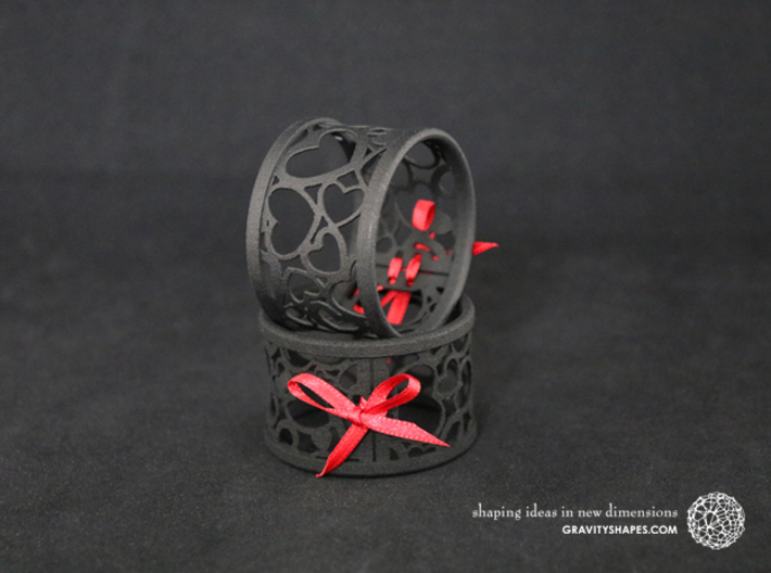  A large napkin ring with Hearts  3d printed The photo shows prints made of black strong and flexible incl. red lacing.