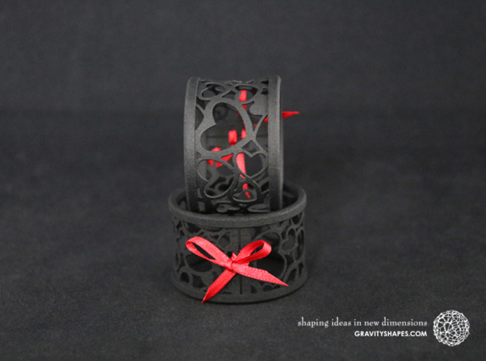  A large napkin ring with Hearts  3d printed The photo shows prints made of black strong and flexible incl. red lacing.