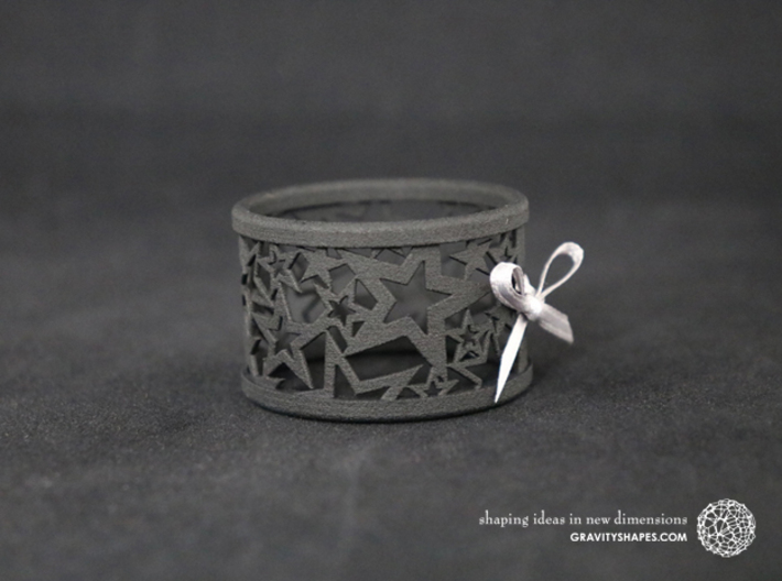 Set of 2 large Christmas napkin rings with Stars 3d printed The photo shows a print made of black strong and flexible incl. silver lacing.