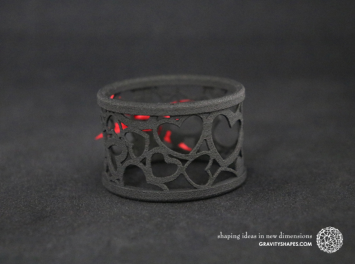 Set of 4 large napkin rings with Hearts 3d printed The photo shows a print made of black strong and flexible incl. red lacing.