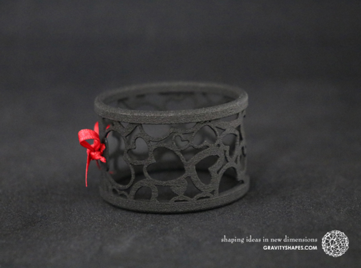 Set of 4 large napkin rings with Hearts 3d printed The photo shows a print made of black strong and flexible incl. red lacing.