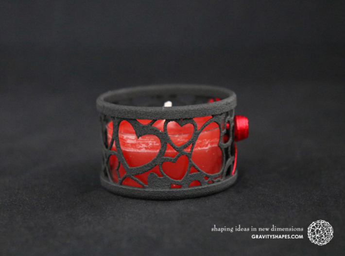 Small tealight holder with Hearts 3d printed The photo shows a print made of black strong and flexible incl. red lacing.