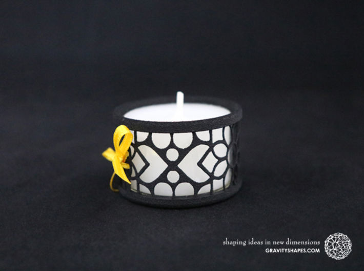 Small tealight holder with Mosaic-2 3d printed The photo shows a print made of black strong and flexible incl. yellow lacing and a high 8h tealight candle.