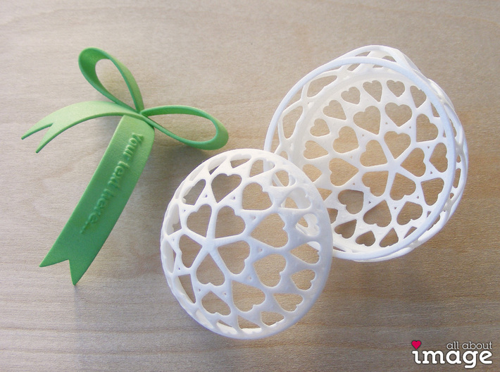 Customizable Christmas Ornament - Snowflakes 3d printed The bauble comes in two halves that snap together. The optional bow snaps into the top