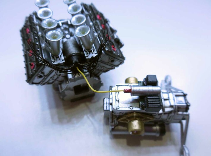 Set of 20 distributors for 1/20th scale Cosworth D 3d printed Installed in an Ebbro's Lotus 49 engine.