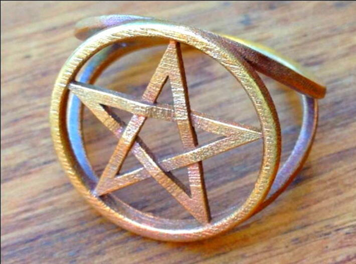Pentacle ring - crossing 3d printed The ring in raw bronze.