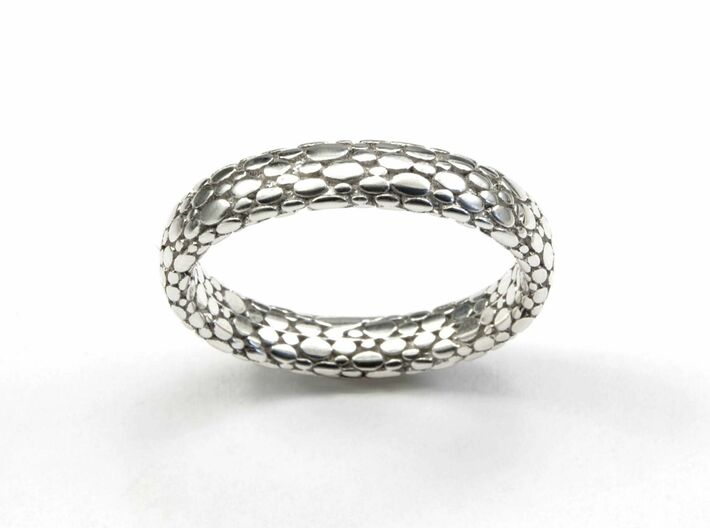 Elipsis Skin Ring 3d printed different Wedding band