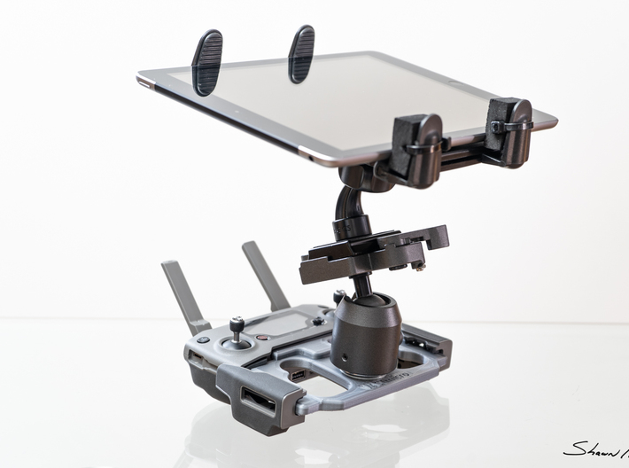 Mobile Device Mounting Plate for DJI Mavic Pro 2 C 3d printed One of many ways to mount a tablet. This is a variant of mine that I use. Example shown in Grey PLA is the one I use daily