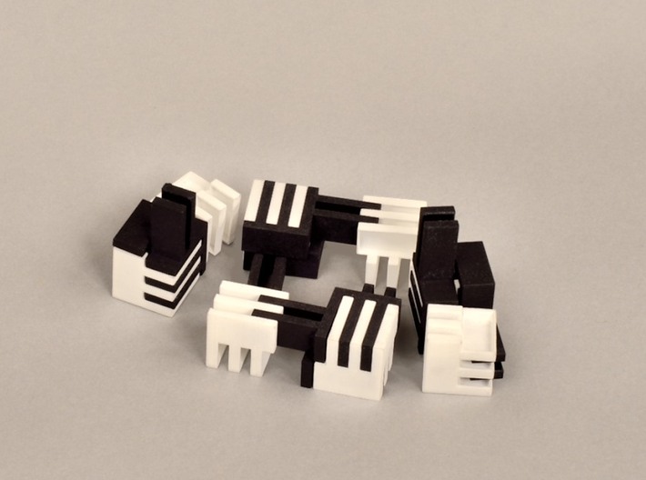 Puzzle Cube, Positive, (white) pieces 3d printed disassembles into eight black and white parts