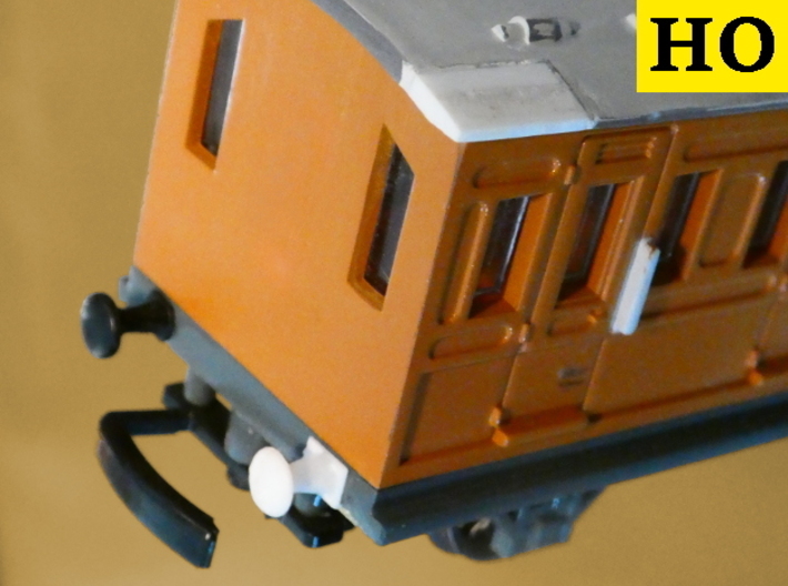 HO/OO Buffer Set, Short-Shank 3d printed This damaged Bachmann coach is being repaired with a short-shank buffer. The included mounting tab fits perfectly in the original mounting hole.