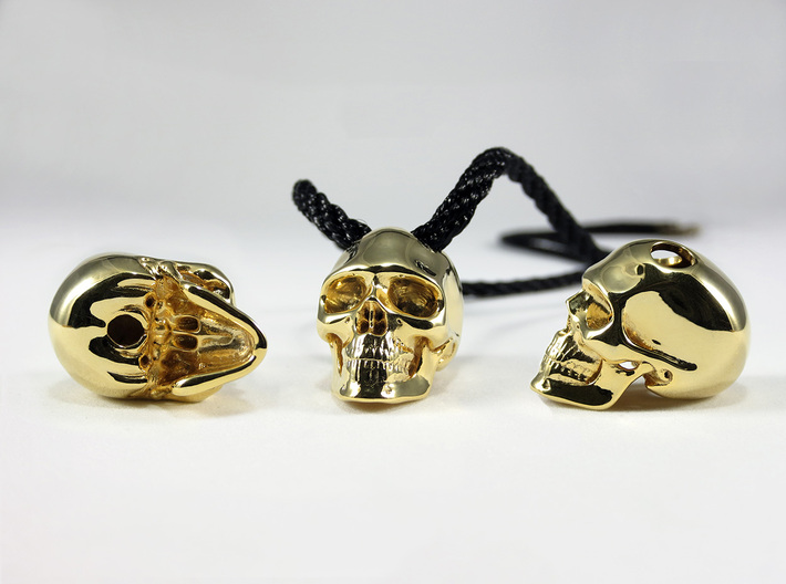 Realistic Human Skull (20mm H) - Pendant 3d printed 20mm H Pendant in Gold Plated Brass