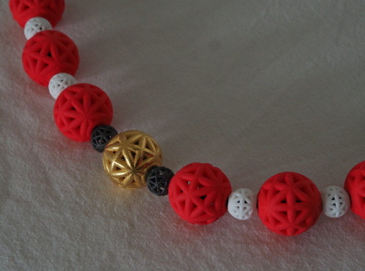 torus_pearl_type6_ultrathin 3d printed Dark Gray PA12 Glass Beads, White Natural Versatile Plastic, Red Processed Versatile Plastic and Polished Gold Steel