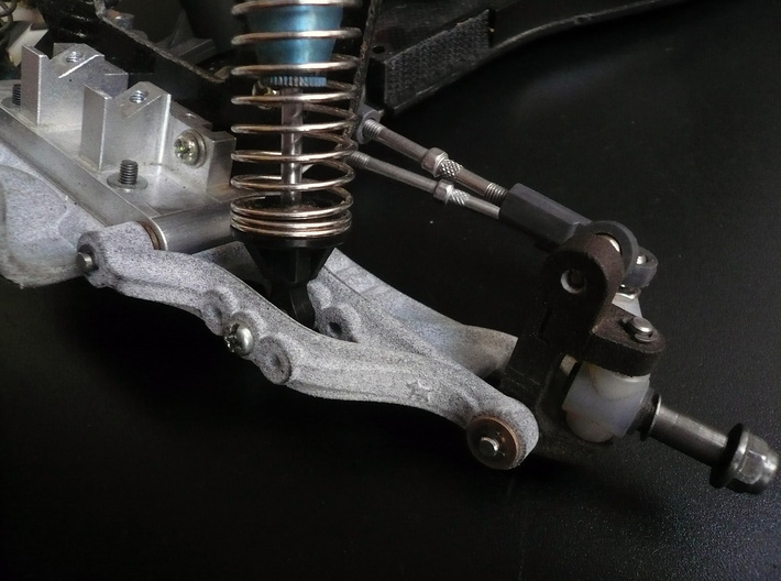 B2 Dyna Storm front suspension arm 3d printed brass bushing Version