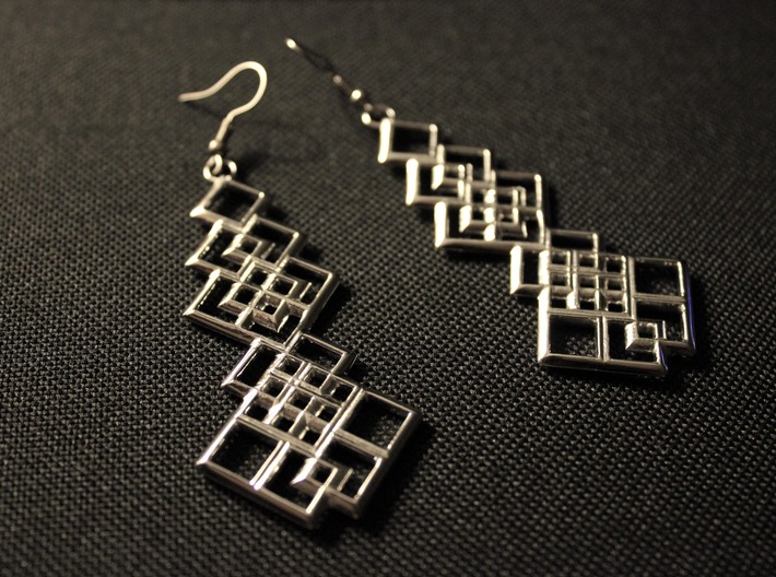 Ensara Earrings 3d printed Product shown was printed in Rhodium Plated Brass.