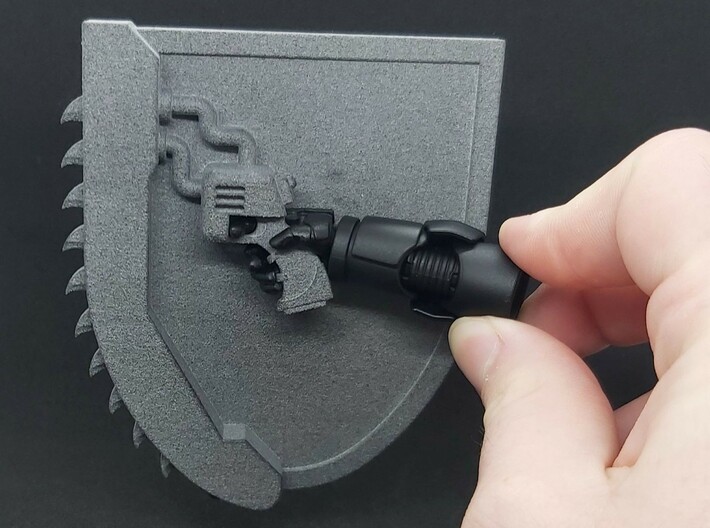 Action Figure Chainshield - Right handed 3d printed Printed in Grey PA12, shown with the hand from a  1:12 action figure holding the grip