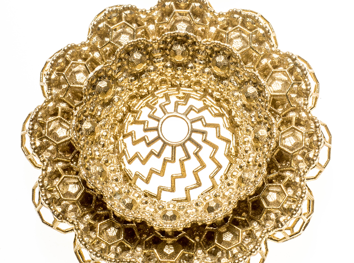 Geo Lotus (2014 version) 3d printed photo of pendant in natural brass
