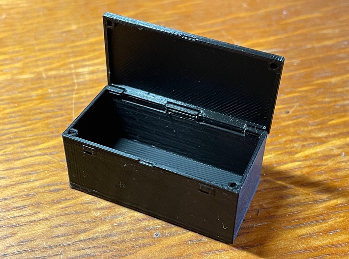 SCX24 C10 Toolbox with holes 3d printed Actual toolbox will have two rectangular holes cut out in the bottom of the back panel. *Prototype shown, actual product may vary*
