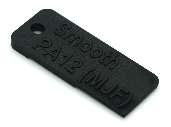 Black Smooth PA12 (MJF) Material Sample 3d printed Black Smooth PA12 (MJF): Dyed and smoothed by using a physio-chemical process to vapor smooth the surface. 