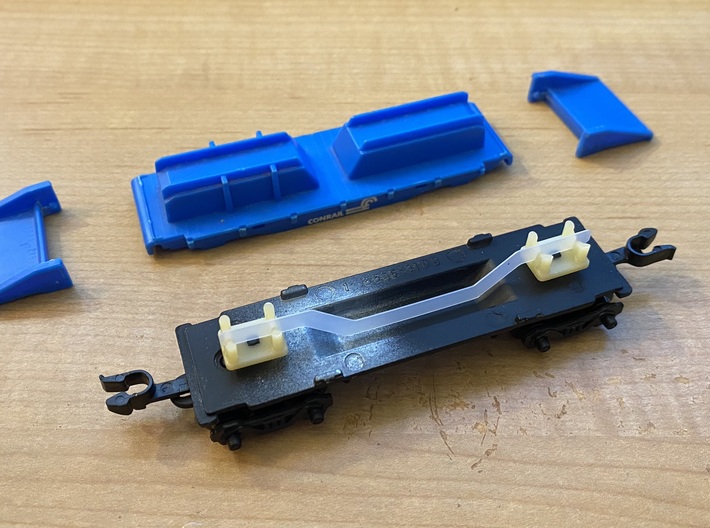 Hot Wheels Railroad Steering Bracket 3d printed Hot Wheels Railroad car with body removed to show the arrangment of the steering mechanism
