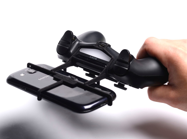 Controller mount for PS4 & LG Optimus L9 P769 3d printed In hand - A Samsung Galaxy S3 and a black PS4 controller