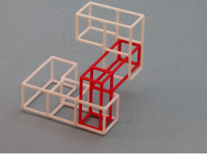 "SOMA's Revenge" - Interlocking Puzzle Cube 3d printed Red inner part interlocked with 2 outer parts