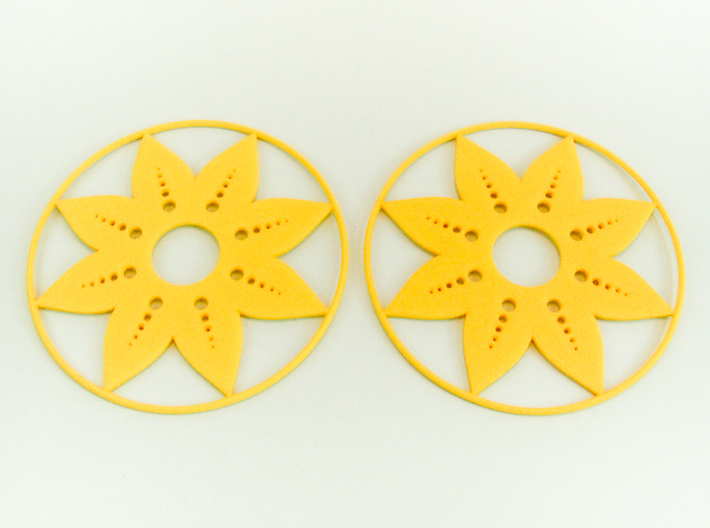 Sunflower Hoop Earrings 60mm 3d printed Sunflower Hoop Earrings 60mm printed in Yellow Strong &amp; Flexible Polished.