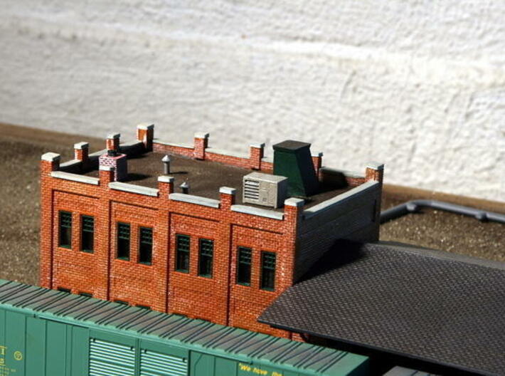 N Scale Rooftop Air Conditoner 3d printed Shown on a rooftop (thanks zosimas for the picture)