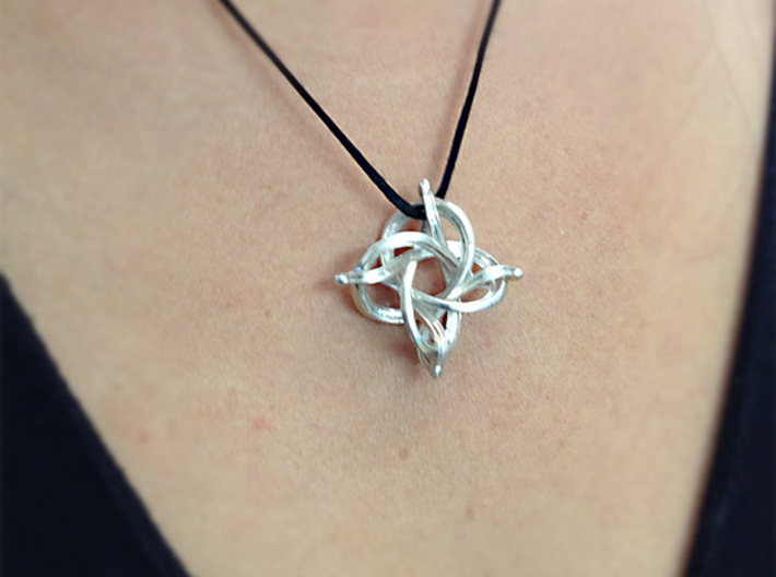 Infinity 3d printed Here is a photo of the necklace in Silver