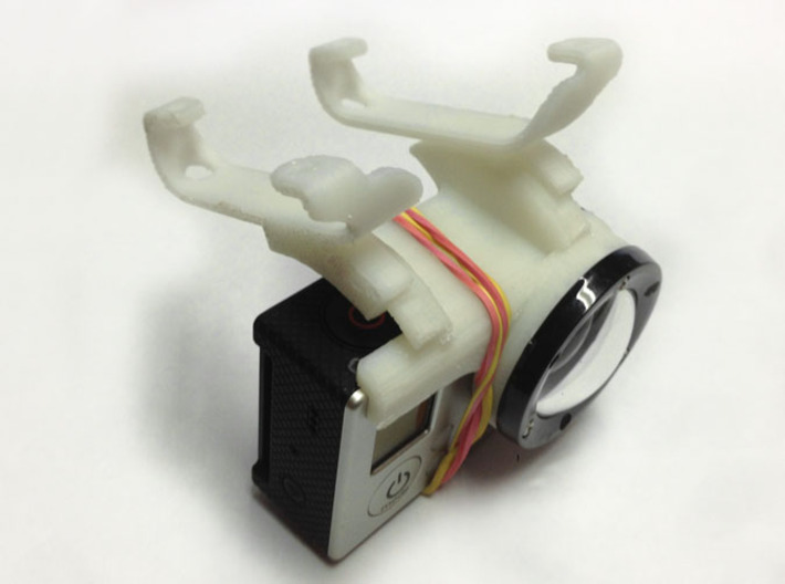 GoPro-Hero3 mount for arDrone2 3d printed top view of prototype - notice rubberband to hold camera. PS the shapeway print is much nicer looking than the prototype