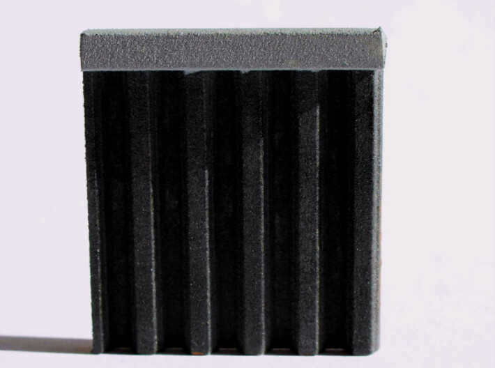 N Scale Bridge Abutment Sheet Piling (55mm) 3d printed Sample piece  of the sheet piling sheet painted black. 
