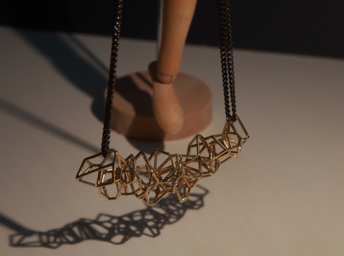 Voronoi Construction Framework Pendent 3d printed 