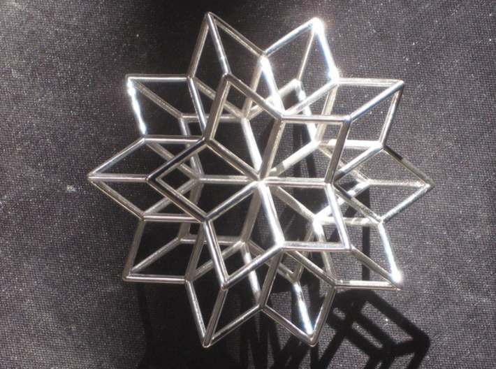 Rhombic Hexecontahedron, 1.65mm round struts 3d printed Photographed in sunshine, showing 5-fold symmetry