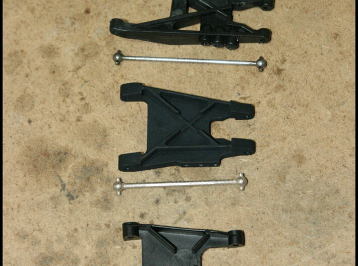 2.7" Dog Bones 3d printed Pictured in the center with my custom 3D printed rear arms.  Compared to stock RC10T stuff on top and stock RC10 buggy stuff on the bottom.