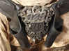 Immortan Joe "240" Codpiece Badge / Emblem 3d printed A photo reference of the screen-used parts for comparison.