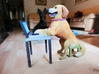 Golden Retriever stuck with Work Laptop 3d printed Golden Retriever having no idea how to work on a laptop