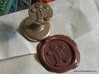 Gingerbread Man Wax Seal 3d printed Gingerbread Man Wax Seal in Stainless Steel, with the impression in Gingerbread Brown sealing wax close up