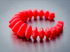 Stegosaurus Ring 3d printed Stegosaurus Ring - Coral Red - Photo