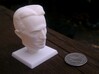 Nikola Tesla Bust 3d printed Nikola Tesla with a quarter for scale