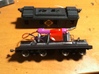 HO Scale Boxcab Locomotive Frame 3d printed This shows a typical installation with two Stanton drives, a TSU-1000 Tsunami decoder and lead weights over the trucks. The frame and trucks now sit at prototypically correct height and the coupler is perfectly in gauge.