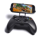 Controller mount for Xbox One & Huawei Honor Note  3d printed Front View - A Samsung Galaxy S3 and a black Xbox One controller