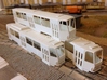 Tatra T6A2 TT [body] 3d printed Tatra T6A2 (at botom) in primer (by exiswelt)