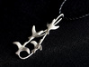 Flying Birds Pendant 3d printed pendant in raw silver on black background