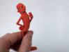 Hueman 'Red' Classic pose Figurine 3d printed Shown in hand for scale reference